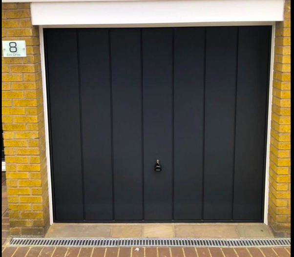 Up-and-over black garage door